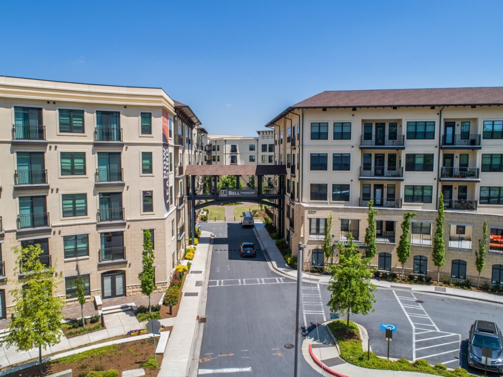 residential building with sky bridge connecting to othe