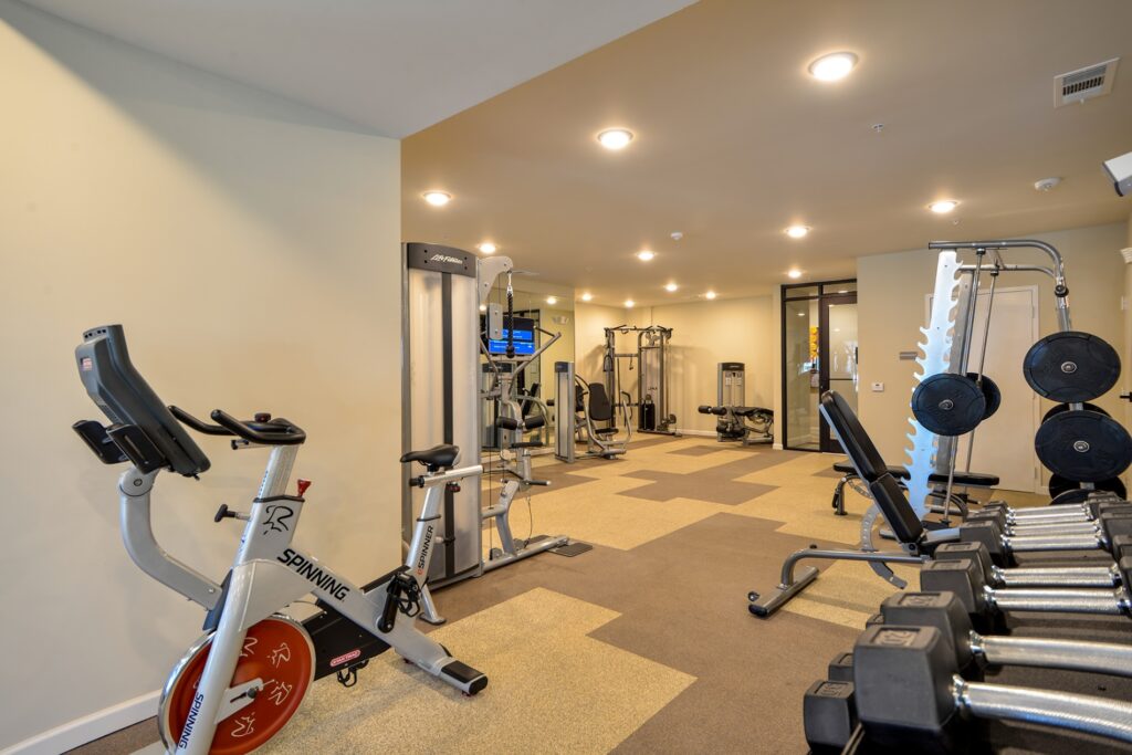 Fitness center with cardio and strength equipment.