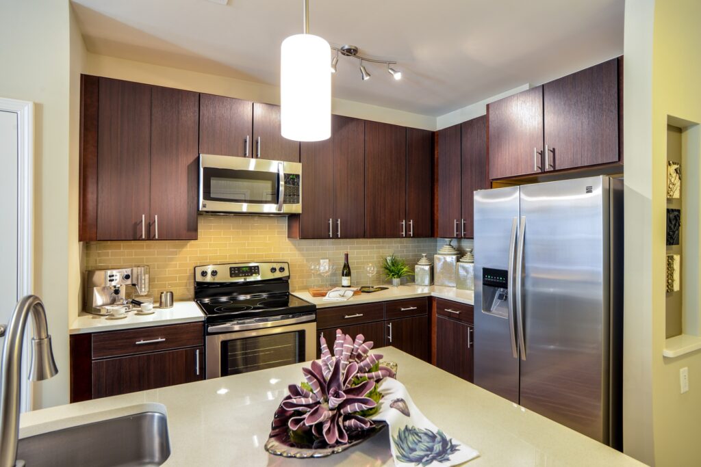 Kitchen with stainless steel appliances, granite countertops, and kitchen island